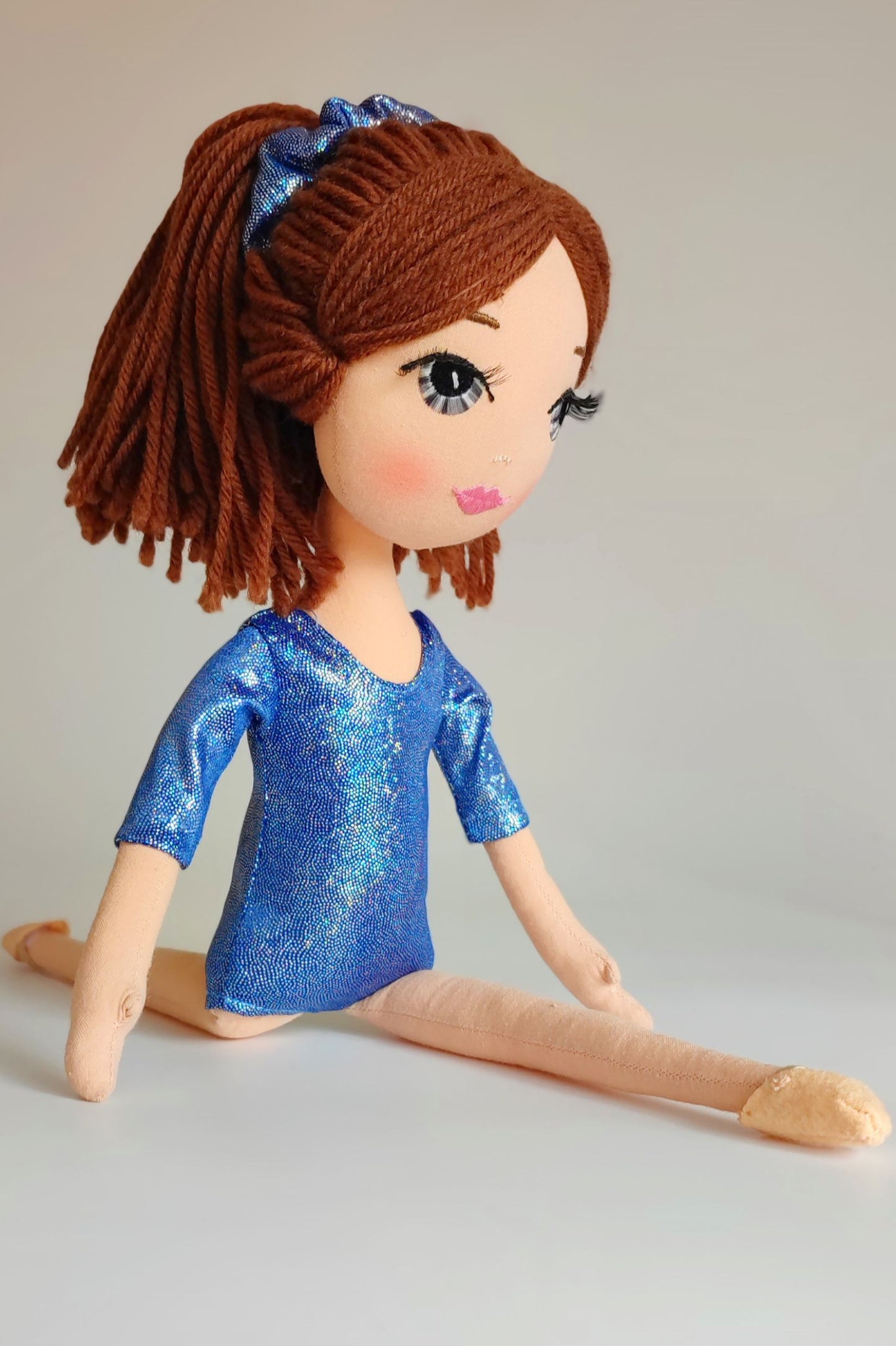 Conjunto maillot y coletero de muñeca gimnasta